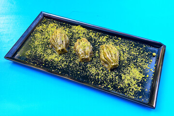 Pistachio baklava. Traditional Middle Eastern Flavors. Traditional Turkish baklava. Local name...
