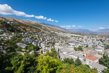 Fototapeta na wymiar Cityscape of the Old Town of Gjirokaster located on the hills, Albania