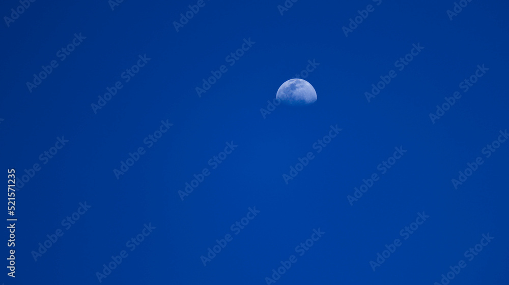 Wall mural blue sky background with moon. moon backdrop.