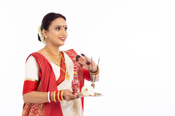 Bengali woman with puja thali.