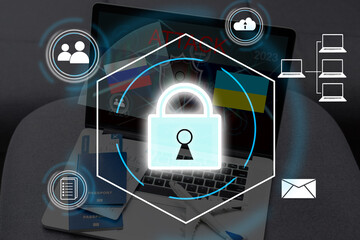 Technology concept with cyber security internet and networking, laptop, screen padlock icon on digital display. flag of Ukraine