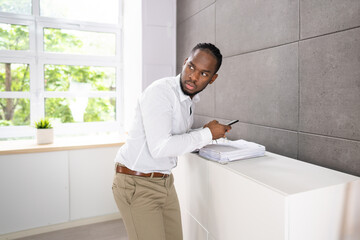 Employee Stealing Documents In Office Using Phone