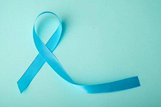 Blue ribbon on background. Prostate cancer awareness month. Blue ribbon symbol of world prostate cancer month and concept of healhcare. Copy space.