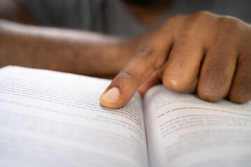 Naklejka premium American African Prayer Man Studying Bible Book