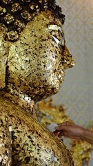 Buddha image of Wat Bosoth, on August 4, 2022, at Wat Bosoth, Sam Khok, Pathum Thani Province. side...