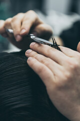 Barbershop haircut styling with dangerous blade