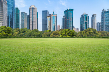 green lawn with city skyline background, shanghai china