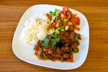 Traditional delicious Turkish food; Turkish style rice pilaf (Turkish name; Arpa sehriyeli. tavuklu, kuru fasulyeli, kavurmali pirinc pilavi)