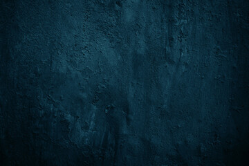 Black green blue texture. Close-up.Toned old concrete surface. Dark grunge background with space...