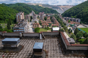 Beautiful Rooftop aerial view of the Majdanpek city residential area and architecture. The city is famous for one of largest mine copper in world. Majdanpek, Bor, Serbia 06.06.2022
