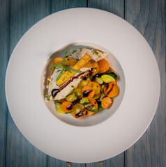 Fish recipe, fillet of sea bass with small vegetables, High quality photo