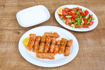 Meatball between bread (Turkish name : ekmek arasi kofte ) Izgara kofte. Manisa, Akcaabat, Akhisar  kofte