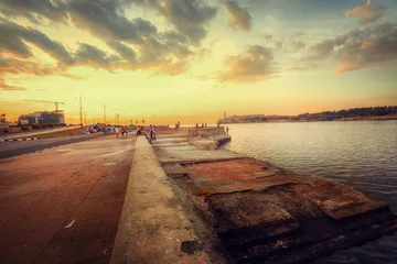 Zelfklevend Fotobehang Sunset at Malecon, the famous Havana promenades where Habaneros, lovers and most of all individual fishermen meet, Havana, Cuba © AJITH.A