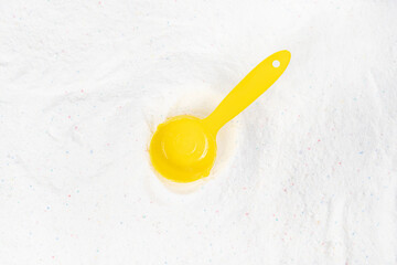 Laundry detergent for washing machines and a plastic scoop for dosing. Washing powder with...