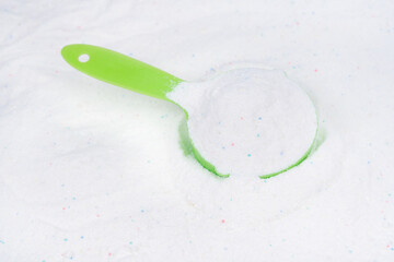 Laundry detergent for washing machines and a plastic scoop for dosing. Washing powder with...