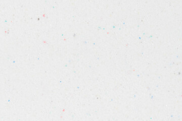 Laundry detergent for washing machines texture background. Washing powder. White wash powder with with colored granules