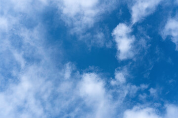 Fototapeta premium Dark blue evening sky with clouds. Blue hour. Heavenly natural background to overlay on your photos.