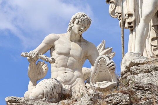 Piazza del Popolo Square Fountain of Neptune Detail with Sculpted Triton and Dolphin in Rome, Italy