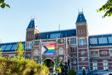 Rijksmuseum in Amsterdam with a Progress Pride Flag on their facade during Gay Pride Amsterdam, The Netherlands, Europe