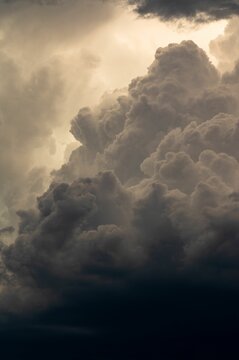 Vertical shot of the gray clouds in the sky