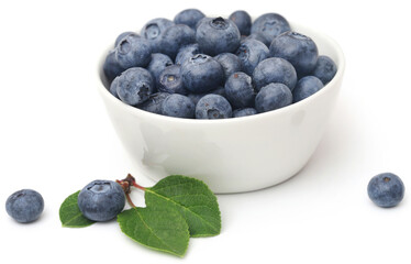 Fresh blueberries over white background
