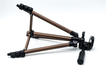 tripod for photo or video camera on white background