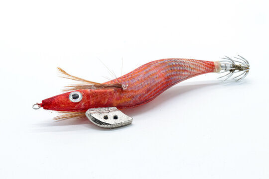 artificial red eging lure for squid fishing isolated on white background
