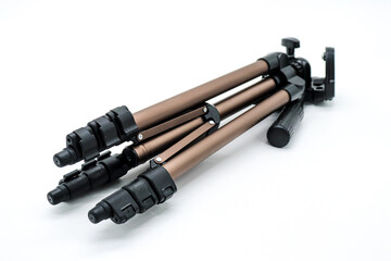 tripod for photo or video camera on white background