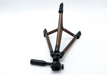 tripod for photo or video camera on white background