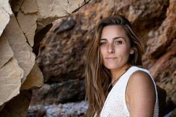 Beautiful Caucasian woman smiling relaxing on summer
