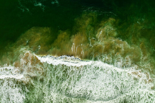 Aerial View Of Waves Along Manning River Coastline, New South Wales, Australia.