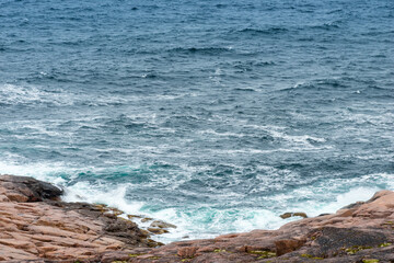Fototapeta premium Summer tundra. Rocky coastline of Barents Sea near Teriberka. Scenery of Russian North. Kola Peninsula, Murmansk Oblast, Russia
