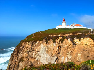 Fototapeta na wymiar Cabo da Roca lighthouse in the most west extent of Portugal belongs to the parques de Sintra
