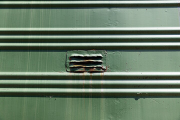 Part of the metal structure of an old steam locomotive