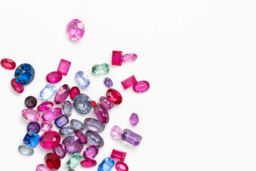 Synthetic Stones for jewellery making. Faceted colorful glass rhinestones on White