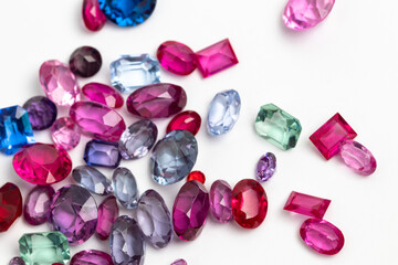 Synthetic Stones for jewellery making. Faceted colorful glass rhinestones on White