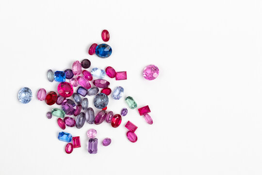 Synthetic Stones for jewellery making. Faceted colorful glass rhinestones on White