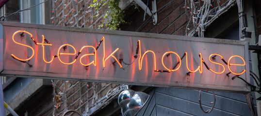 neon steak house restaurant wall mounted sign