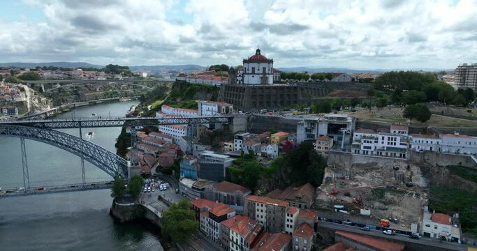 Porto Portugal Aerial View. Dom Luis Bridge at Sunrise. Porto, Portugal. Cityscape of Downtown Touristic Ribeira. Olt Town. Douro River.