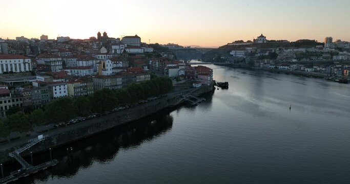 Porto Portugal Aerial View. Dom Luis Bridge at Sunrise. Porto, Portugal. Cityscape of Downtown Touristic Ribeira. Olt Town. Douro River.