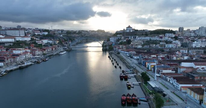 Porto Portugal Aerial View. Dom Luis Bridge at Sunrise. Porto, Portugal. Cityscape of Downtown Touristic Ribeira. Olt Town. Douro River.