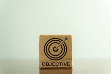 Business Objective target and Goal Concept.,Selective focus Virtual target board icon and OBJECTIVE text on wooden cube over white background.