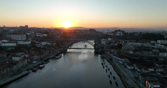 Porto Portugal Aerial View. Dom Luis Bridge at Sunrise. Porto, Portugal. Cityscape of Downtown Touristic Ribeira. Olt Town. Douro River.