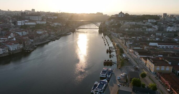 Porto Portugal Aerial View. Dom Luis Bridge at Sunrise. Porto, Portugal. Cityscape of Downtown Touristic Ribeira. Olt Town. Douro River.