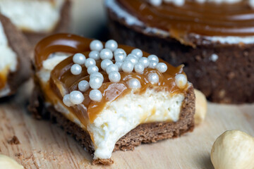 chocolate tartlet with cream filling and salted caramel with nuts