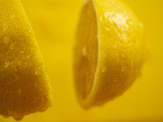 Cut the lemon with a knife in the air.