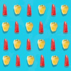 Colorful yellow and red pepper pattern on bright blue background. Raw vegetables- low carb diet concept.