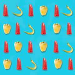 Colorful pattern made of yellow, red and green chilli  pepper on bright blue background. Raw vegetables- loose weight concept.