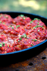 Appetizing fresh meatballs in tomato sauce. Meat dish meatballs in traditional sauce. Meatballs in...