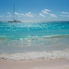 Fototapeta na wymiar Beautiful sea, Caribbean Sea.tropical island, sailing yacht on the horizon